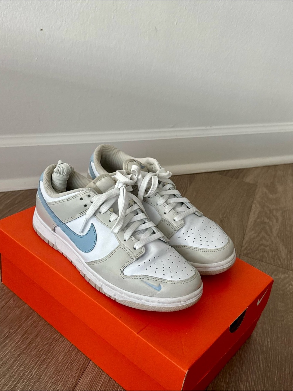 Nike woman’s  Low-Top Sneakers — White & Light Blue Accents